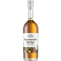 Der Unterthurner Bauernnusseler Barrique Likör präsentiert ein Aroma von gerösteten Haselnüssen