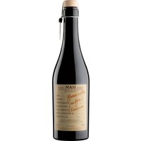 Masi Grappa di Mezzanella zeigt sich im Glas mit einem warmen Bernsteinton